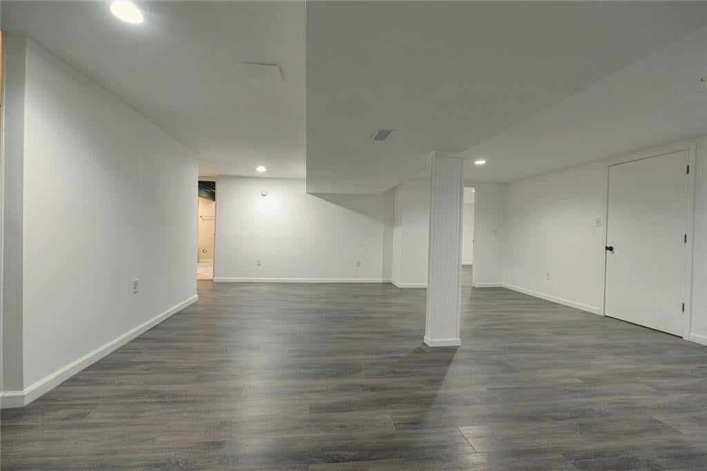 Finished basement, recessed lighting and staircase at 16604 E 53rd Street S, Independence, MO 64055