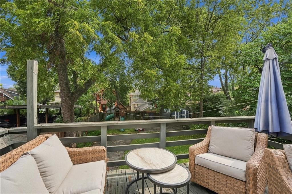 Deck and mature trees at 5127 Walnut Street, Kansas City, MO 64112