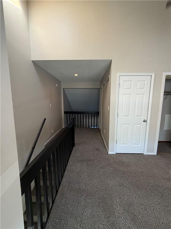 Staircase and wood stair railing at 725 SW Liggett Road #C, Blue Springs, MO 64015