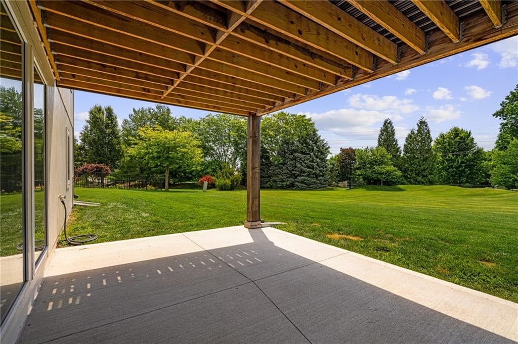 Big backyard, mature trees and flat lot at 4209 NE Hideaway Drive, Lee's Summit, MO 64064