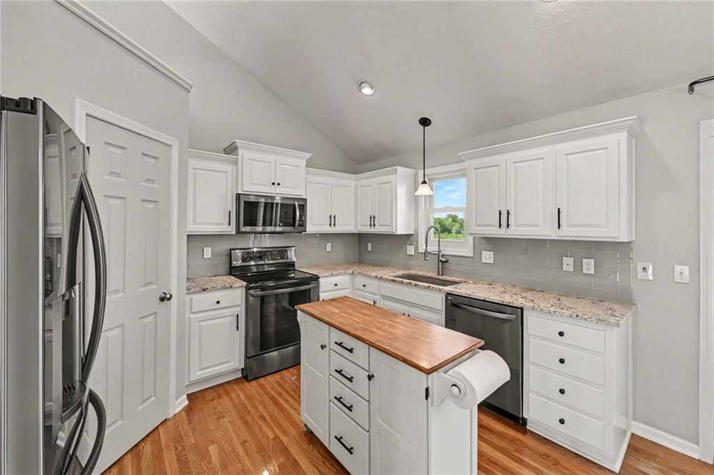 Photo 8 of 32 - 1204 N 4th Street E, Louisburg, KS 66053