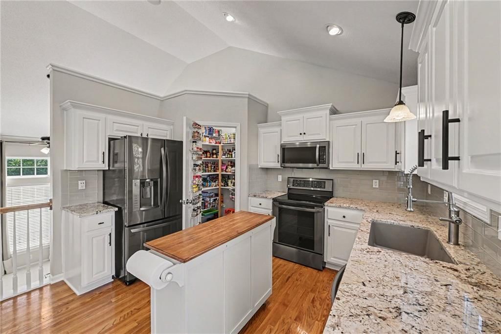 Photo 9 of 32 - 1204 N 4th Street E, Louisburg, KS 66053
