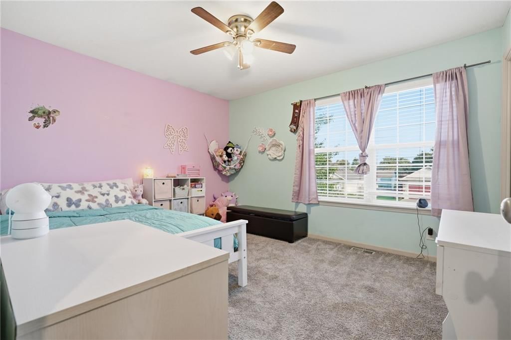 Photo 15 of 29 - 1009 Granada Drive, Raymore, MO 64083