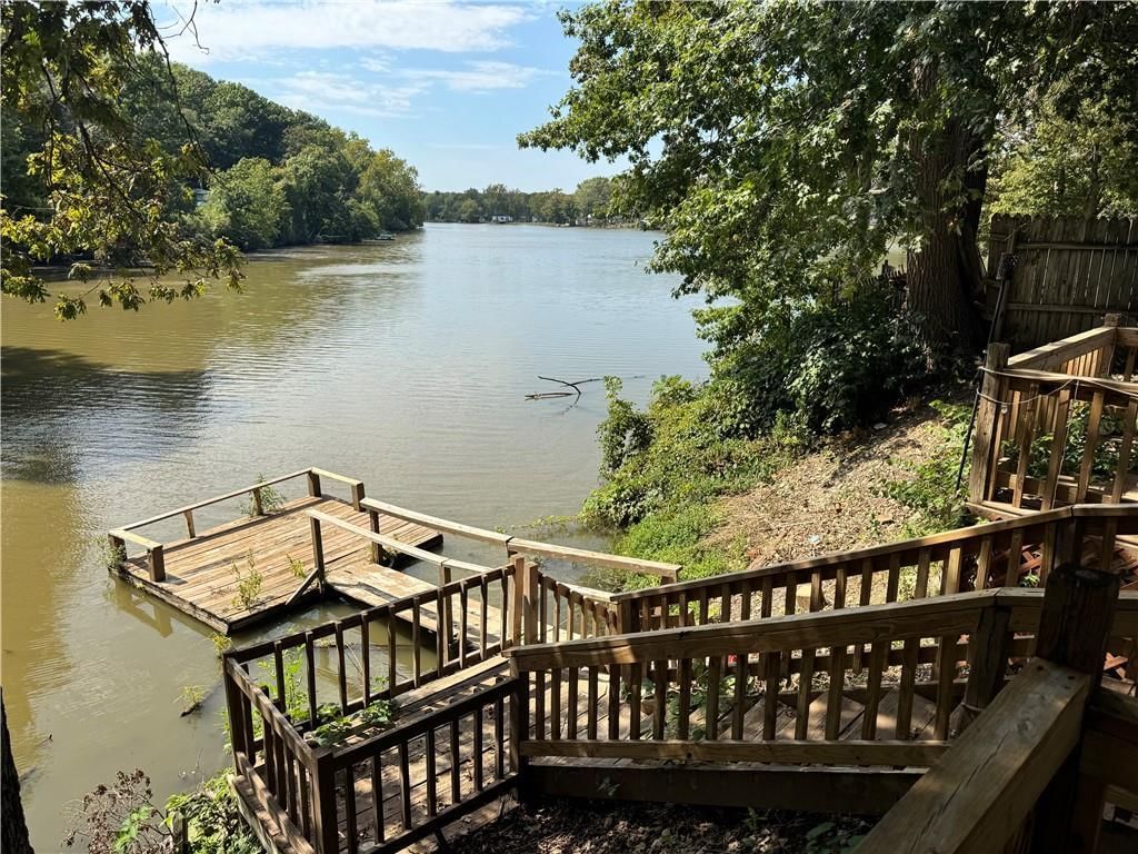 Lake visible from the property and pond or creek visible on the lot at 8409 Curly Lane, Freeman, MO 64746