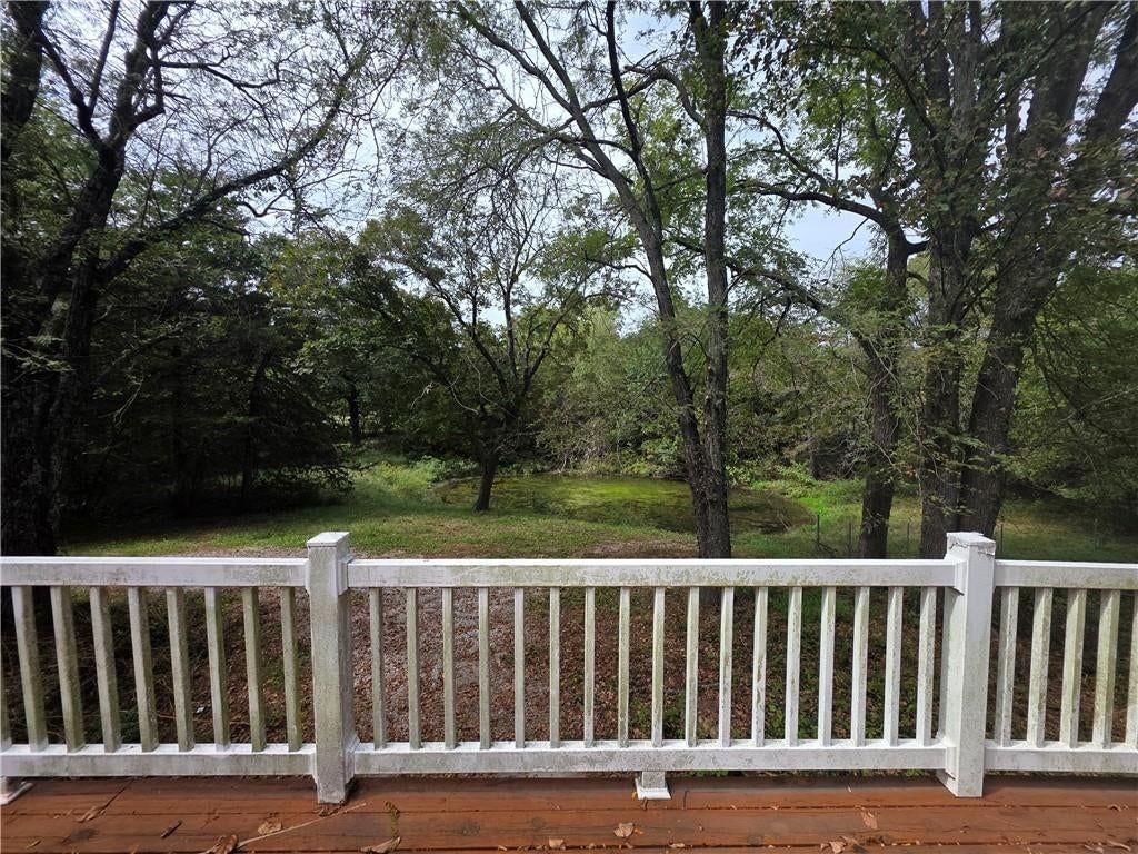 Big backyard, mature trees and flat lot at 16840 W 287th Street, Paola, KS 66071