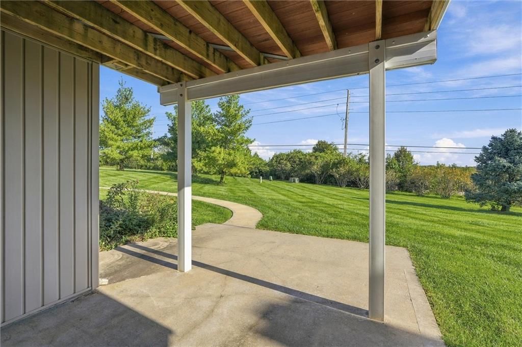 Deck, mature trees and composite deck at 7600 NE 113th Street, Kansas City, MO 64157
