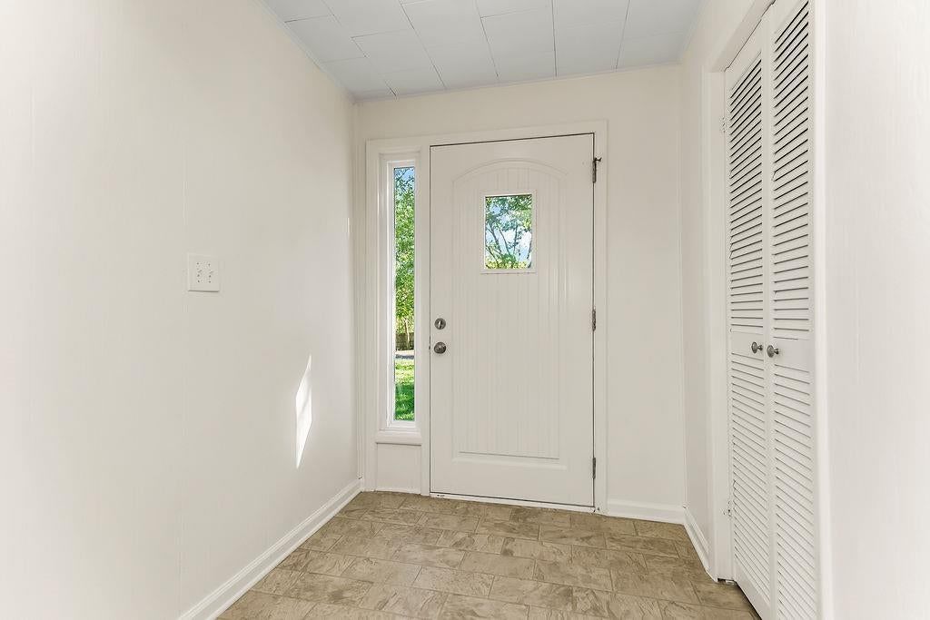 Tile floors, white trim and white walls at 16000 Allen Avenue, Belton, MO 64012