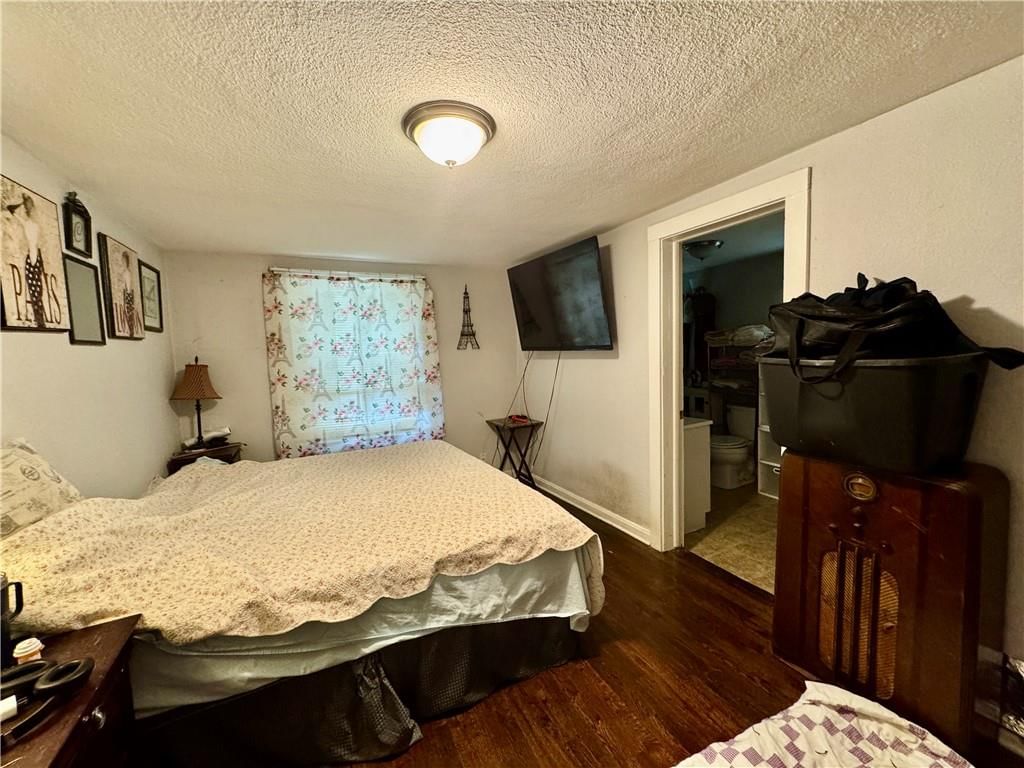 Main-floor primary bedroom at 10020 W 51st Street, Merriam, KS 66203