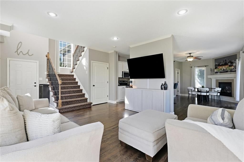Staircase and wood stair railing at 16917 Cross Creek Drive, Belton, MO 64012
