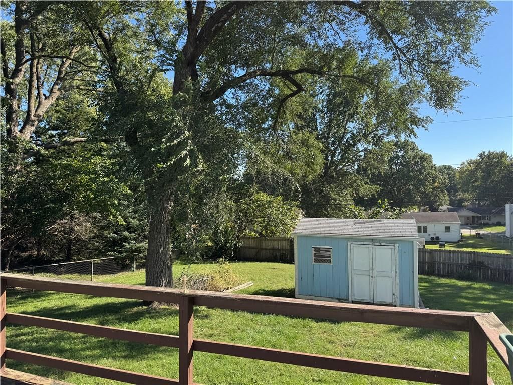 Big backyard, fenced yard and mature trees at 1401 NE 67th Terrace, Gladstone, MO 64118