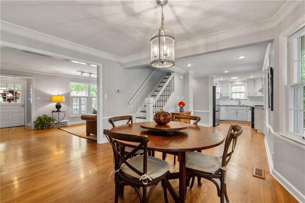Open floor plan, statement lighting and breakfast nook at 5307 Aberdeen Road, Fairway, KS 66205