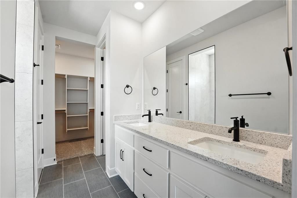 Double vanity and white vanity at 20579 Barker Street, Spring Hill, KS 66083