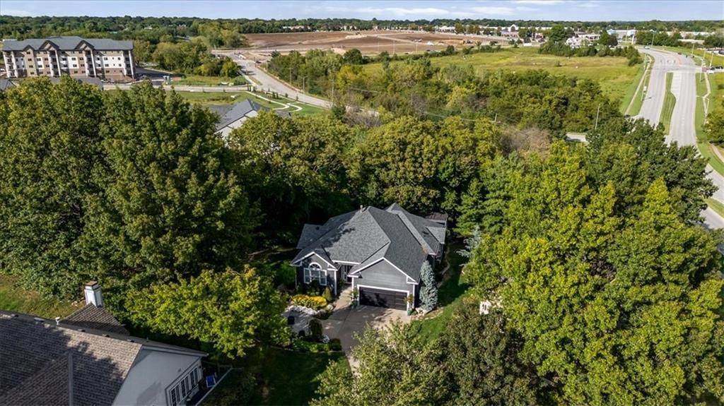 Mature trees and flat lot at 13725 Pembroke Circle, Leawood, KS 66224