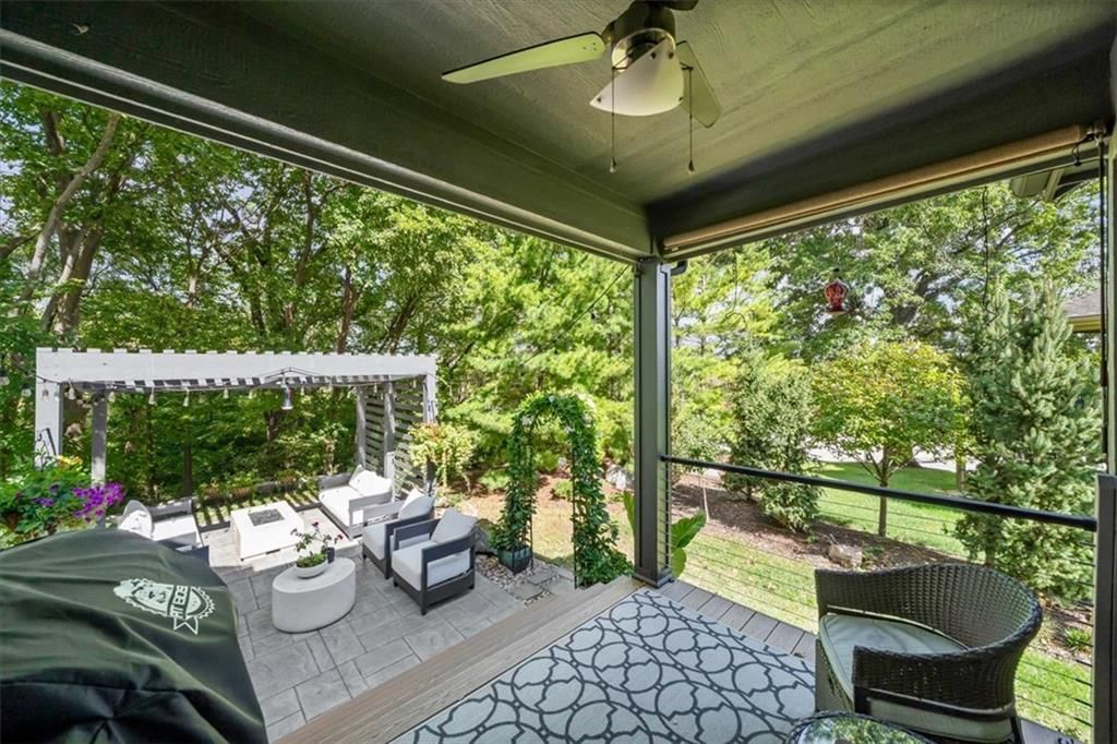 Pergola, fire pit and paver patio at 13725 Pembroke Circle, Leawood, KS 66224