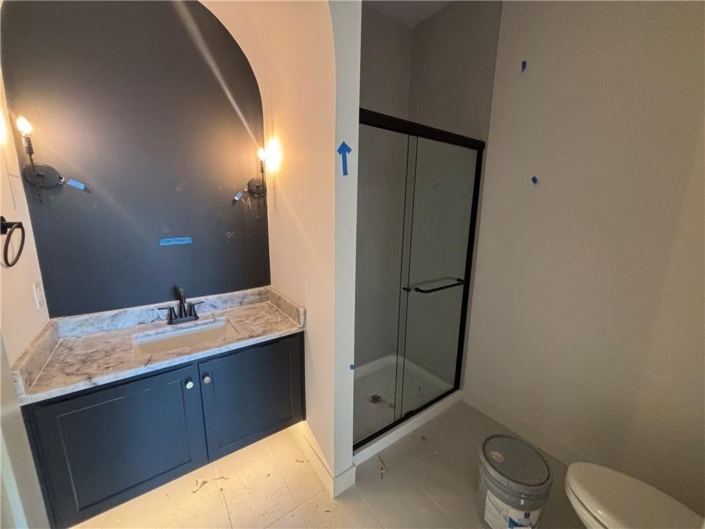 Tile floors and black hardware at 9714 W 175th Terrace, Overland Park, KS 66221