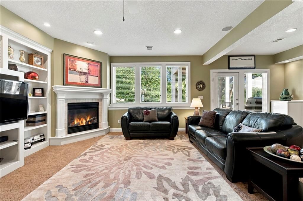 Fireplace and home office at 624 W 131 Terrace, Kansas City, MO 64145