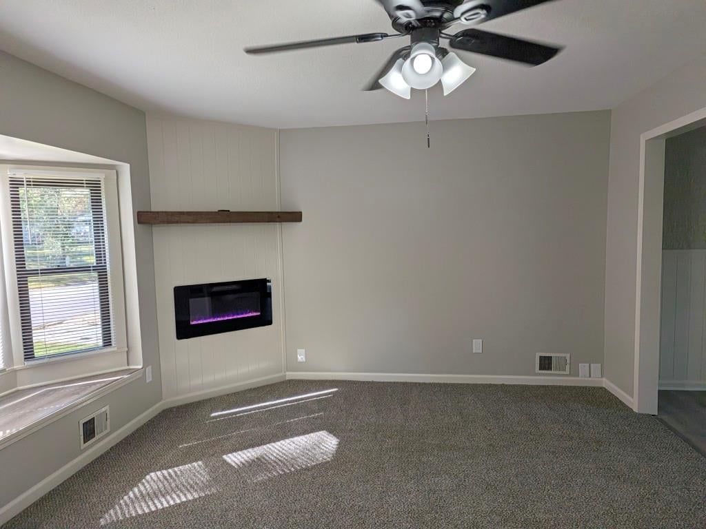 Fireplace and shiplap / paneling at 306 SE 21st Street, Oak Grove, MO 64075