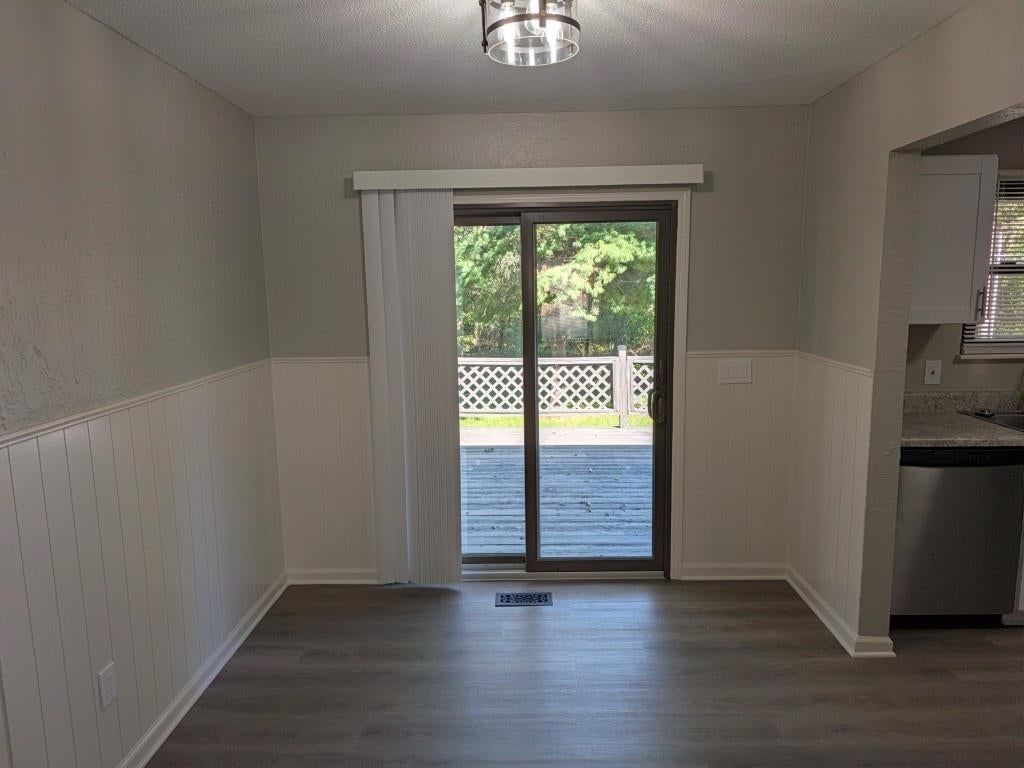Wainscoting or board and batten and breakfast nook at 306 SE 21st Street, Oak Grove, MO 64075