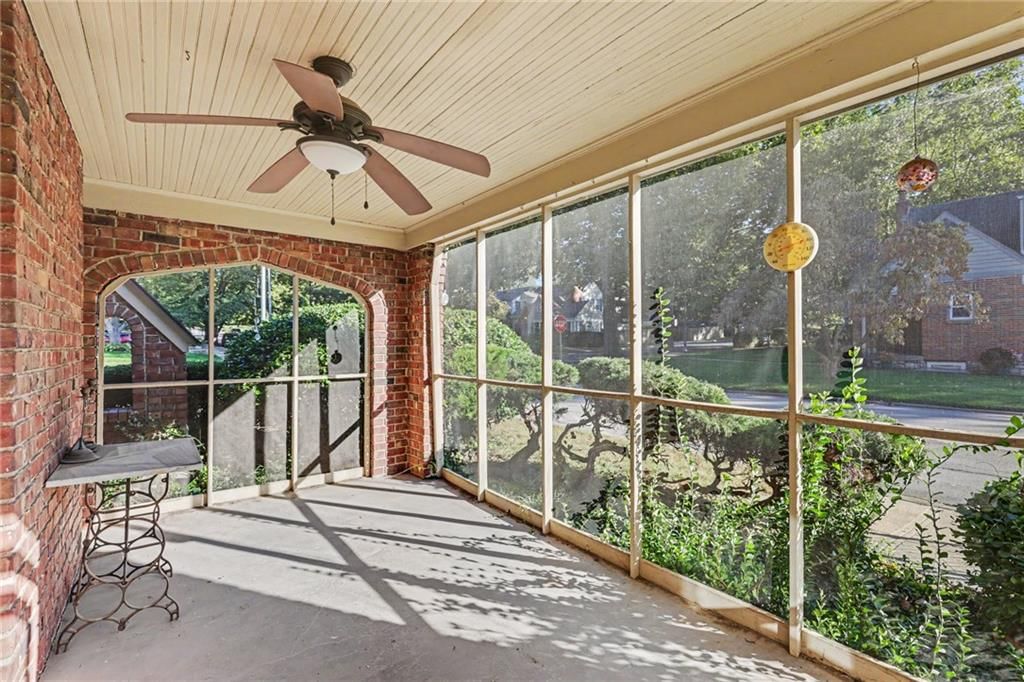 Screened porch at 7346 GRAND Avenue, Kansas City, MO 64114