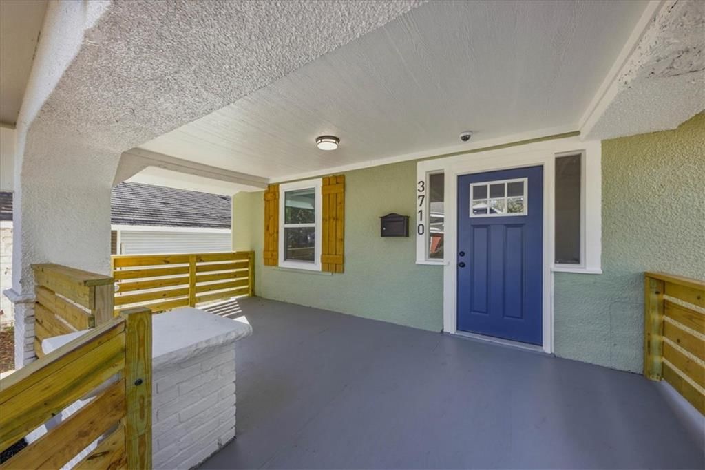 Covered front porch at 3710 Agnes Avenue, Kansas City, MO 64128