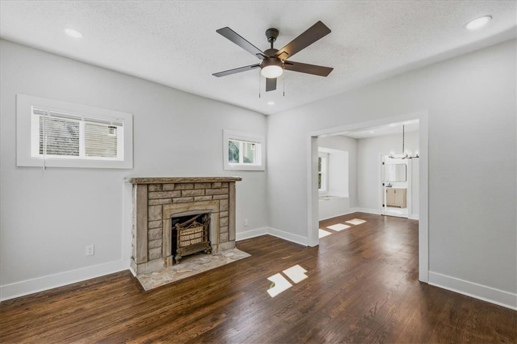Fireplace and hardwood floors at 3710 Agnes Avenue, Kansas City, MO 64128