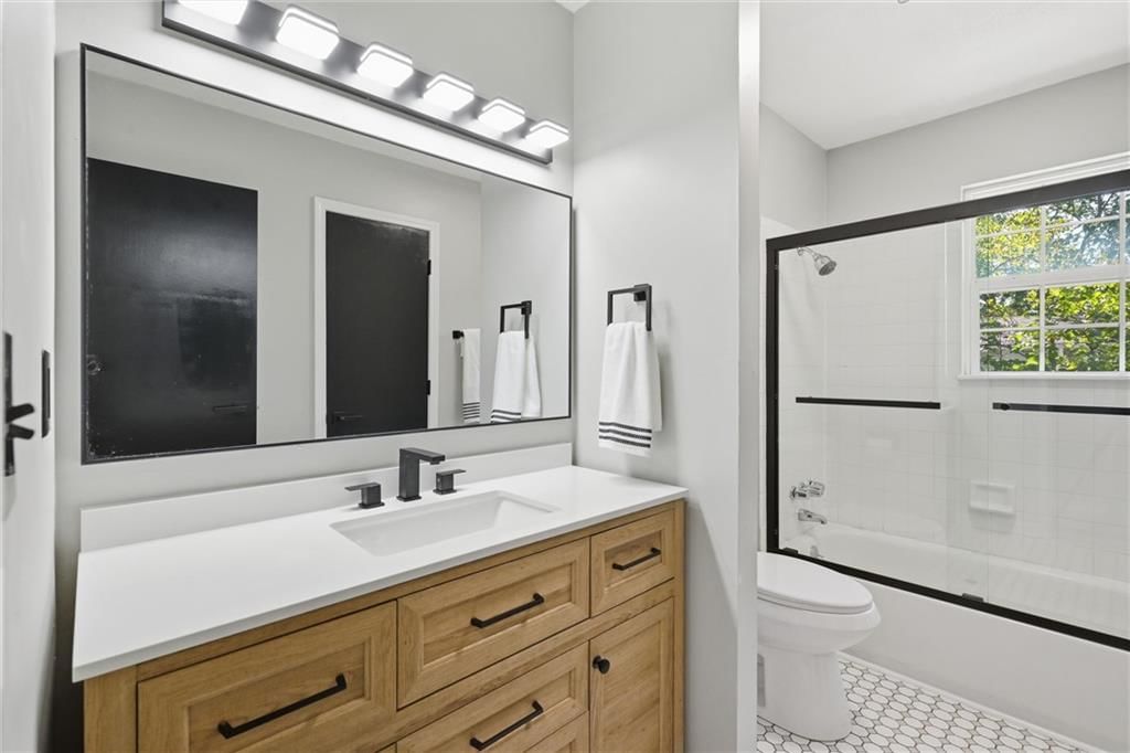 Renovated bathrooms at 205 SW Kingscross Road, Blue Springs, MO 64014