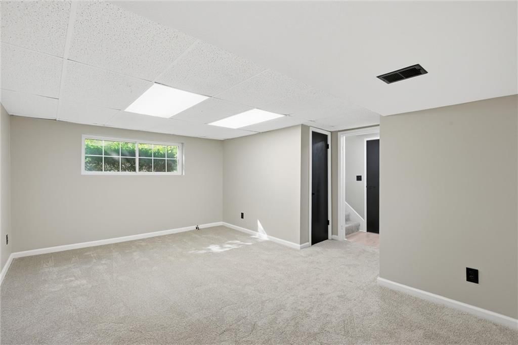 Finished basement at 205 SW Kingscross Road, Blue Springs, MO 64014
