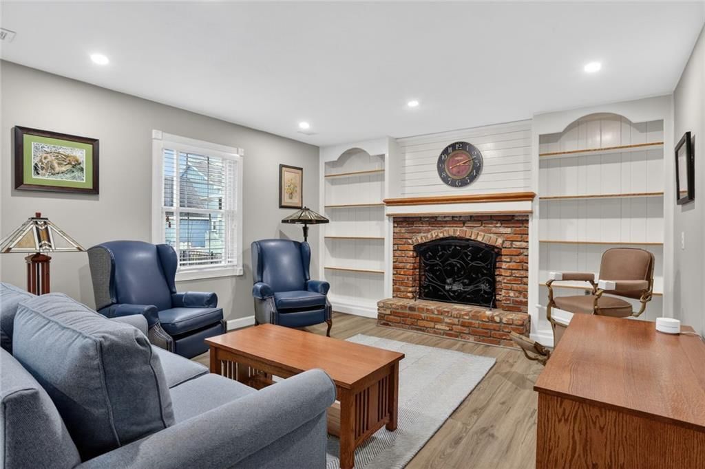 Fireplace and shiplap / paneling at 14813 W 83rd Terrace, Lenexa, KS 66215