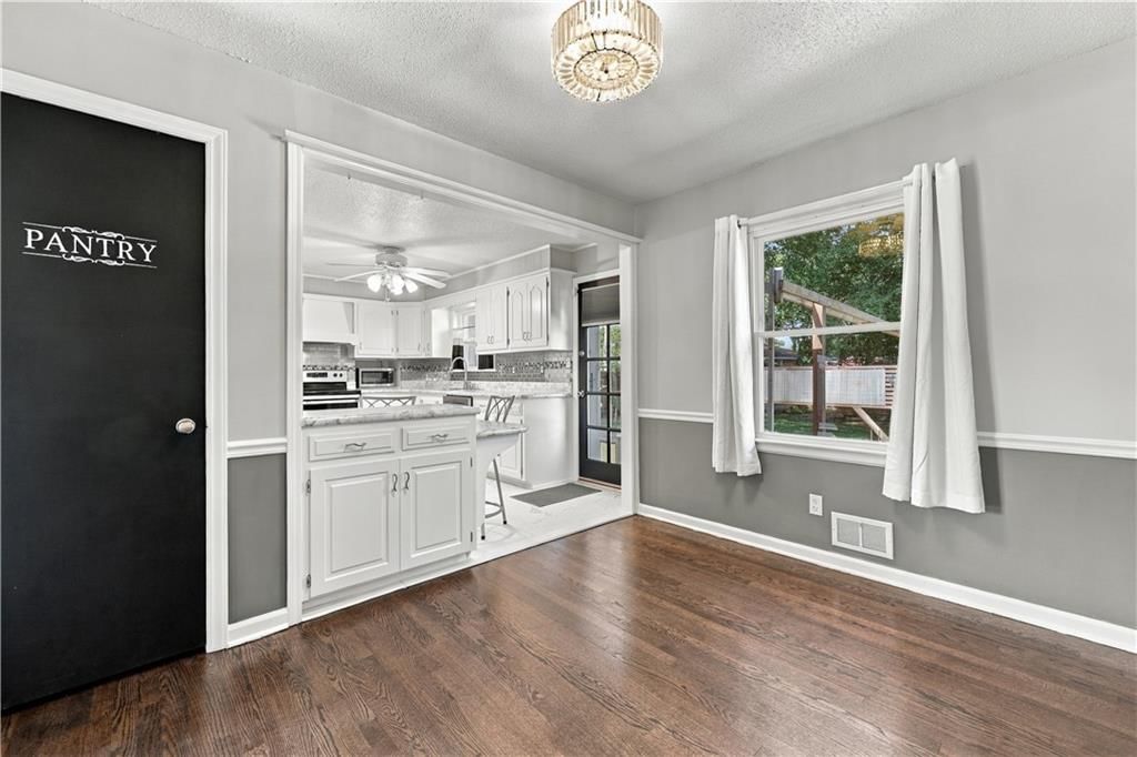 Walk-in pantry and black hardware at 12004 E 48th Street S, Kansas City, MO 64133