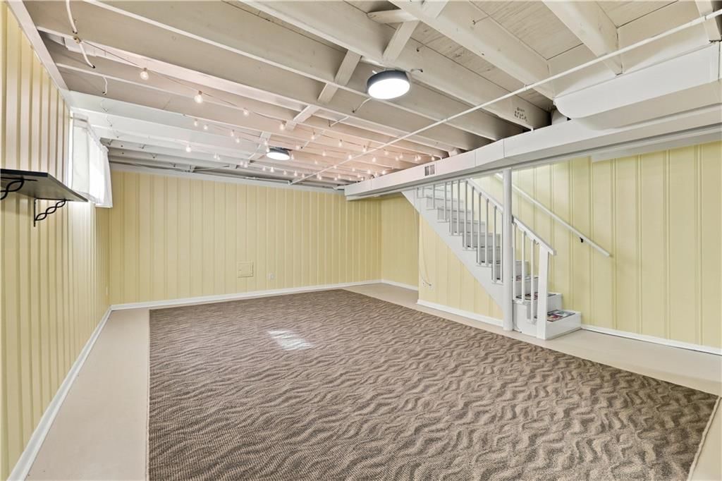Finished basement and shiplap / paneling at 12004 E 48th Street S, Kansas City, MO 64133
