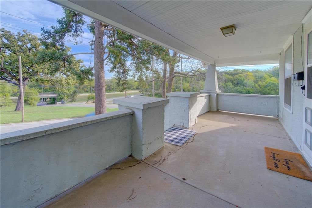 Covered front porch at 3003 Ruby Avenue, Kansas City, KS 66106