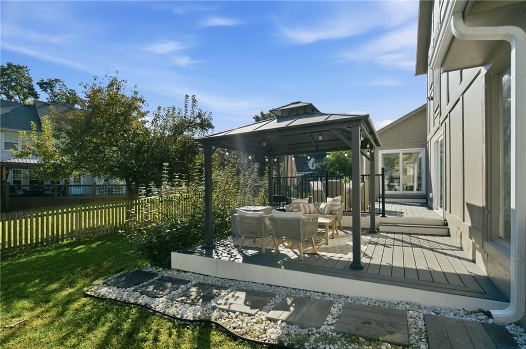 Deck, big backyard and pergola at 206 NE Shoreview Drive, Lee's Summit, MO 64064