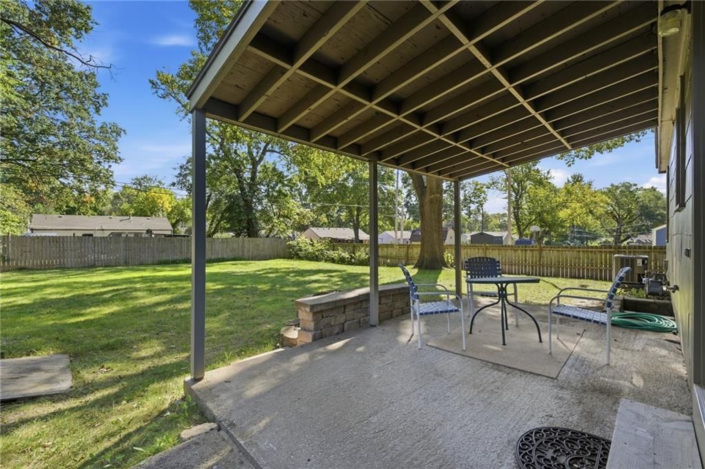 Fenced yard and fire pit at 7049 Horton Street, Overland Park, KS 66204
