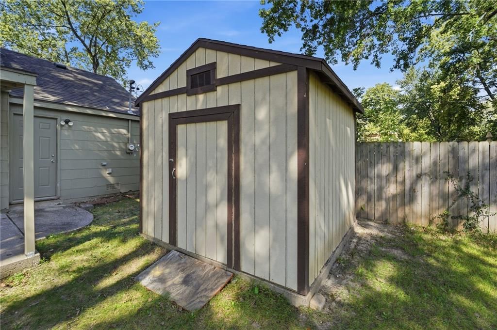 Big backyard and mature trees at 7049 Horton Street, Overland Park, KS 66204