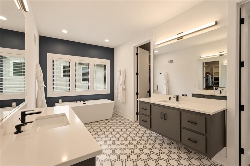 Freestanding tub and double vanity at 12602 W 169 Terrace, Overland Park, KS 66221