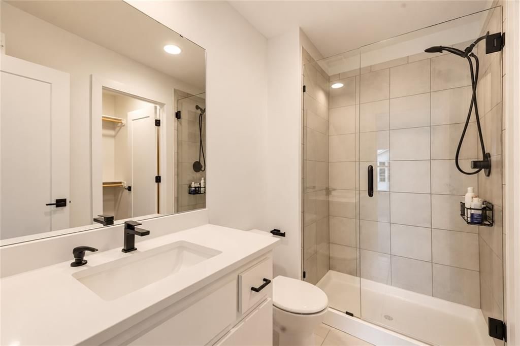 Walk-in shower, tiled shower and frameless glass shower at 12602 W 169 Terrace, Overland Park, KS 66221