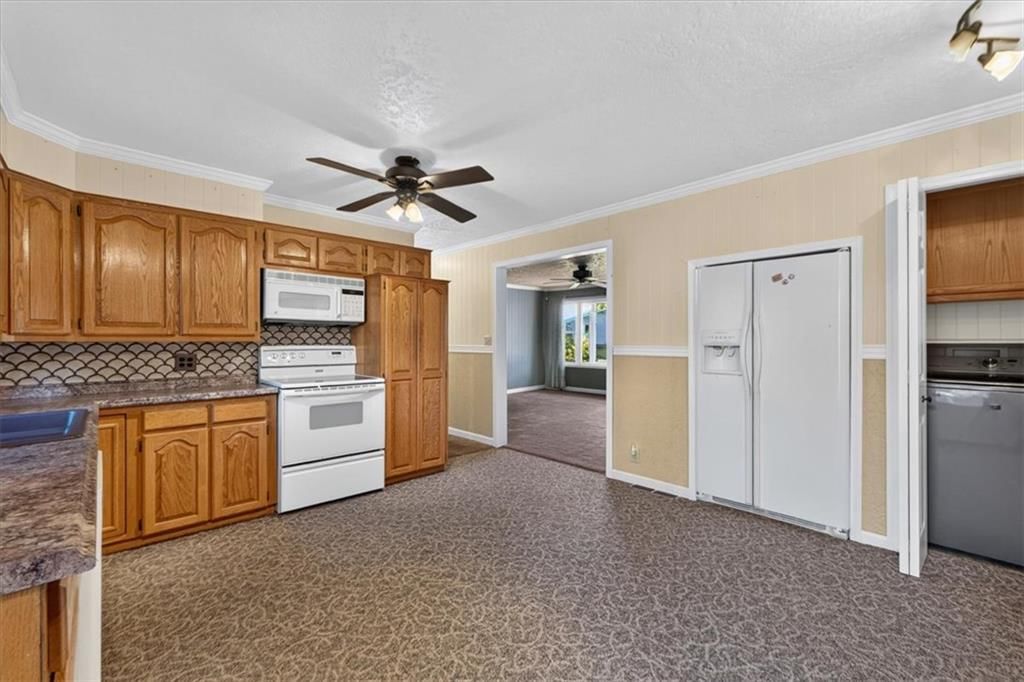 Photo 8 of 34 - 340 Champ Street, Peculiar, MO 64078