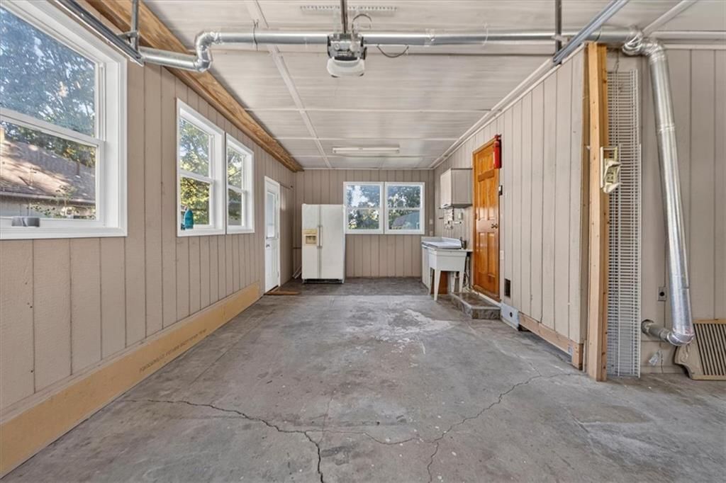 Attached garage at 340 Champ Street, Peculiar, MO 64078