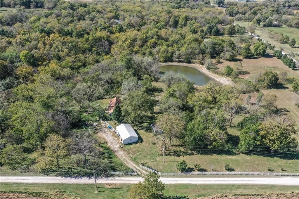 Pond or creek visible on the lot, corner lot and flat lot at 31103 E 315TH Street, Garden City, MO 64747