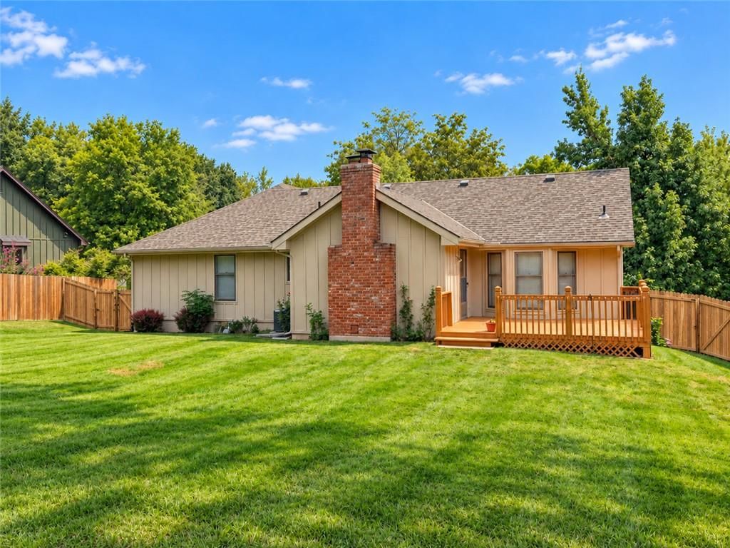 Fireplace, deck and big backyard at 4903 NW 67th Terrace, Kansas City, MO 64151