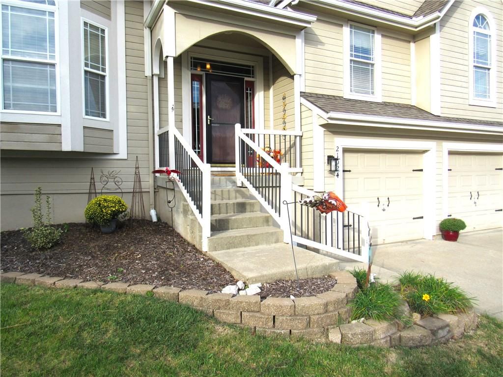 Covered front porch at 21024 W 116th Terrace, Olathe, KS 66061