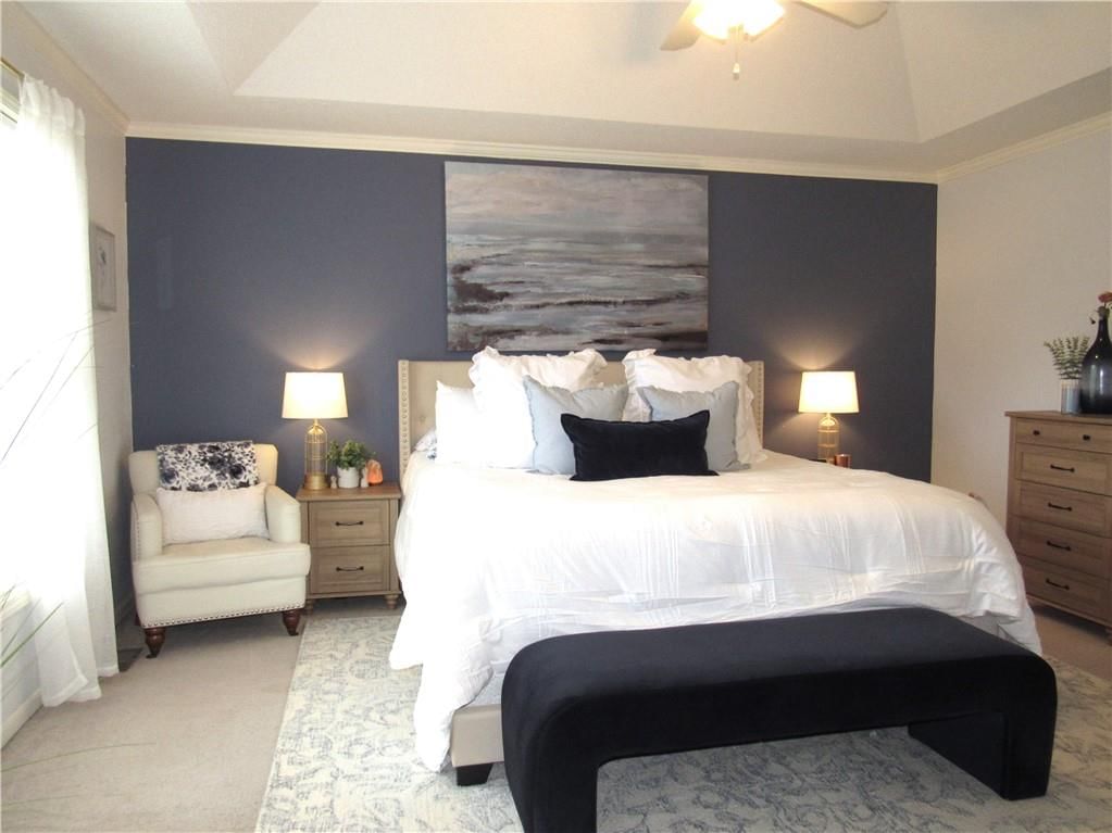 Tray ceiling, accent wall and carpet at 21024 W 116th Terrace, Olathe, KS 66061