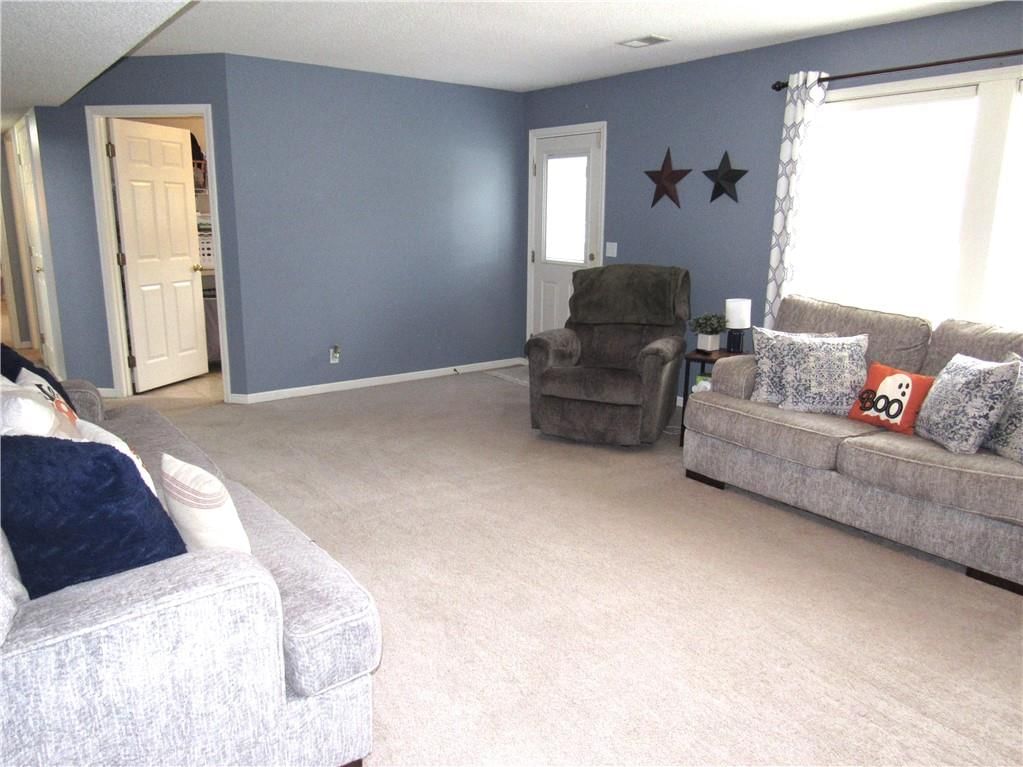 Finished basement and fireplace at 21024 W 116th Terrace, Olathe, KS 66061
