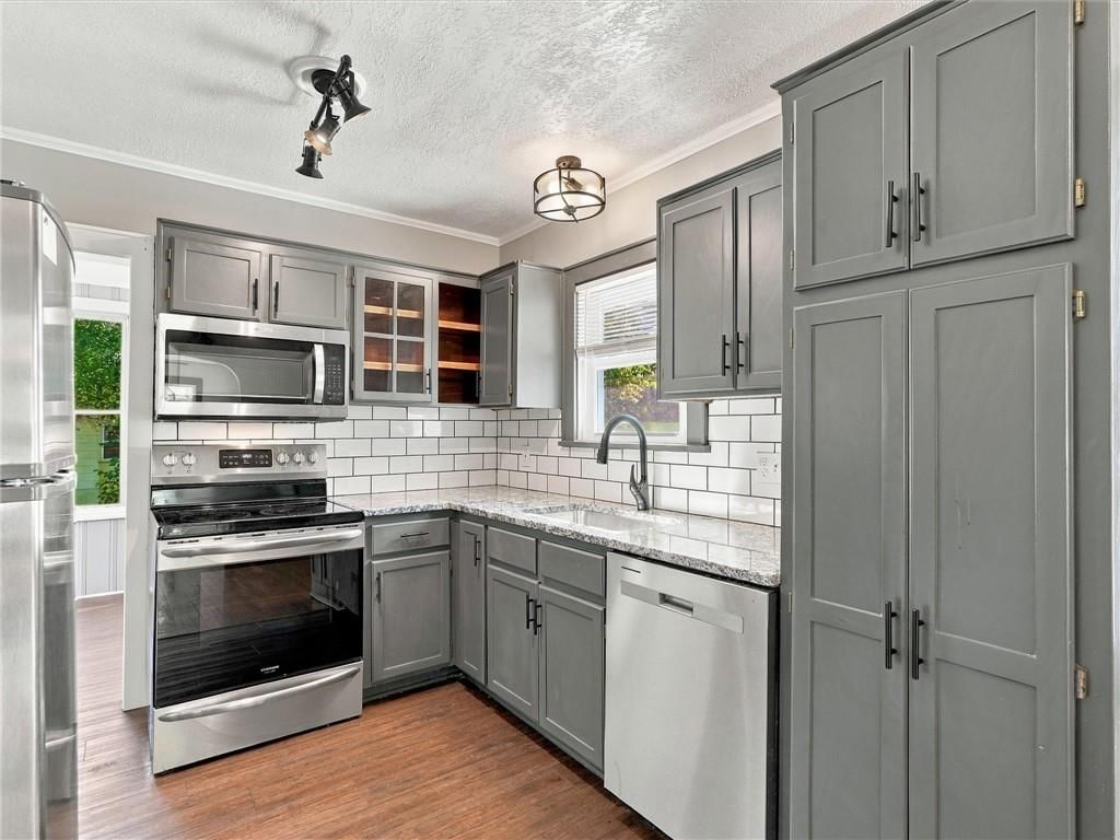 Glass-front cabinets at 51 N Emerson Street, Kansas City, MO 64119