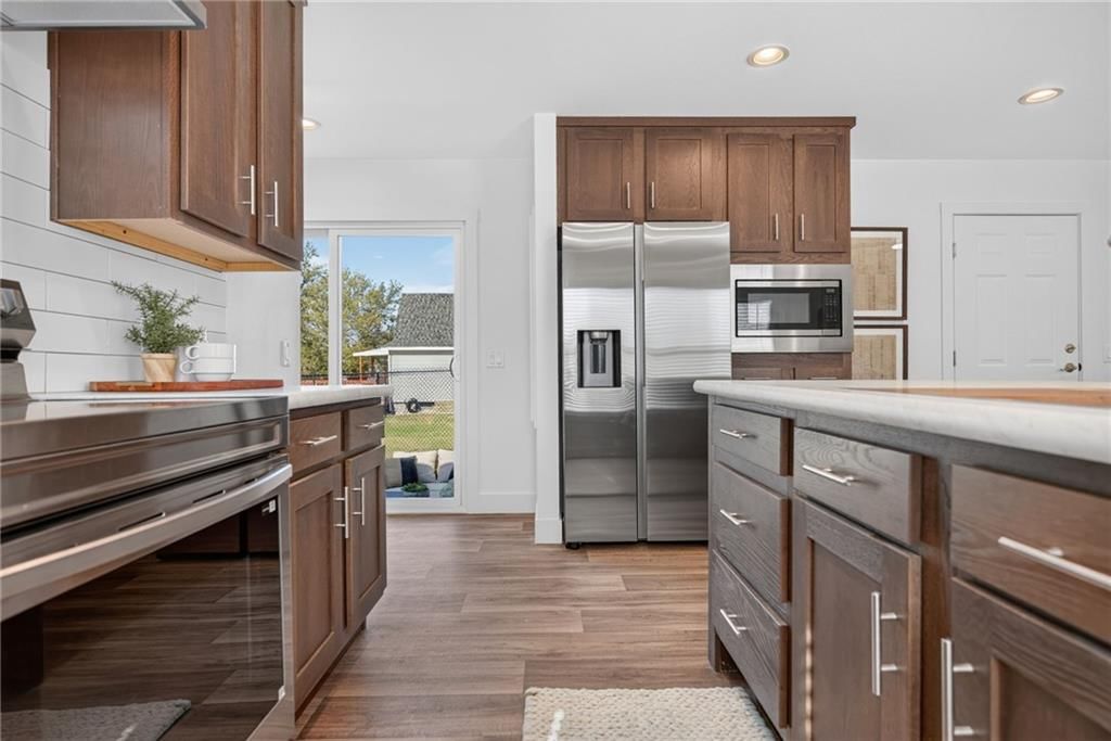 Stainless steel appliances and electric range at 2544 Hiawatha Street, Kansas City, KS 66104