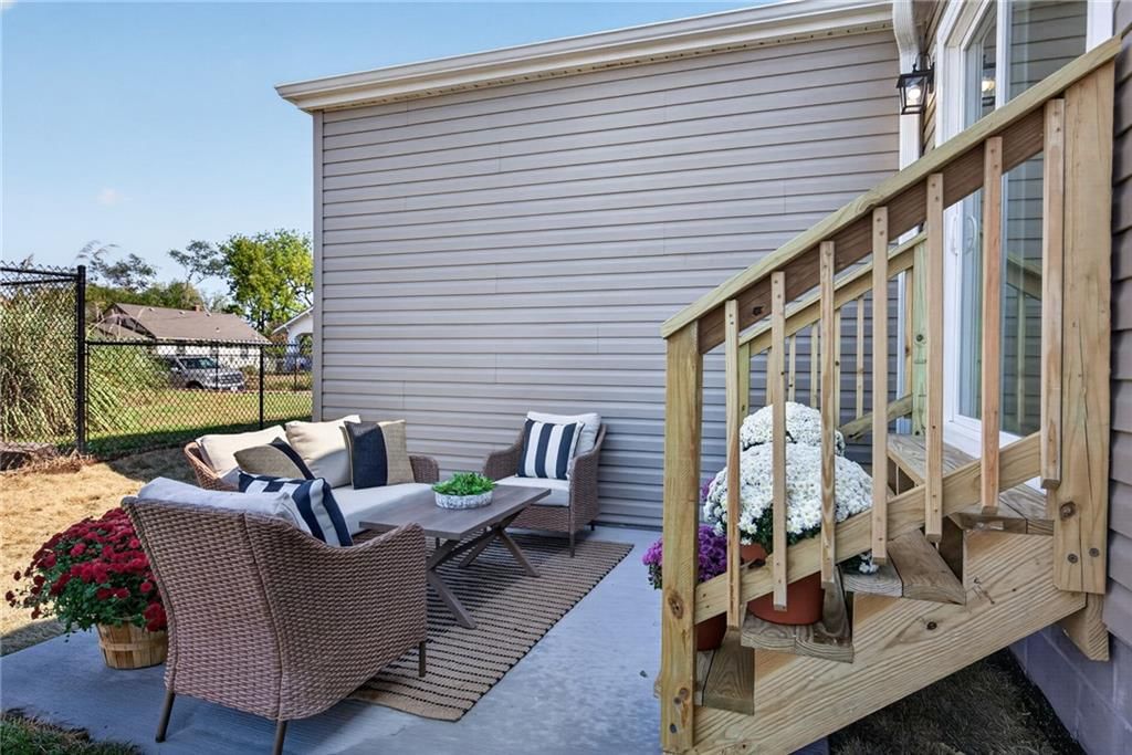 Fenced yard, chain-link fence and concrete patio at 2544 Hiawatha Street, Kansas City, KS 66104