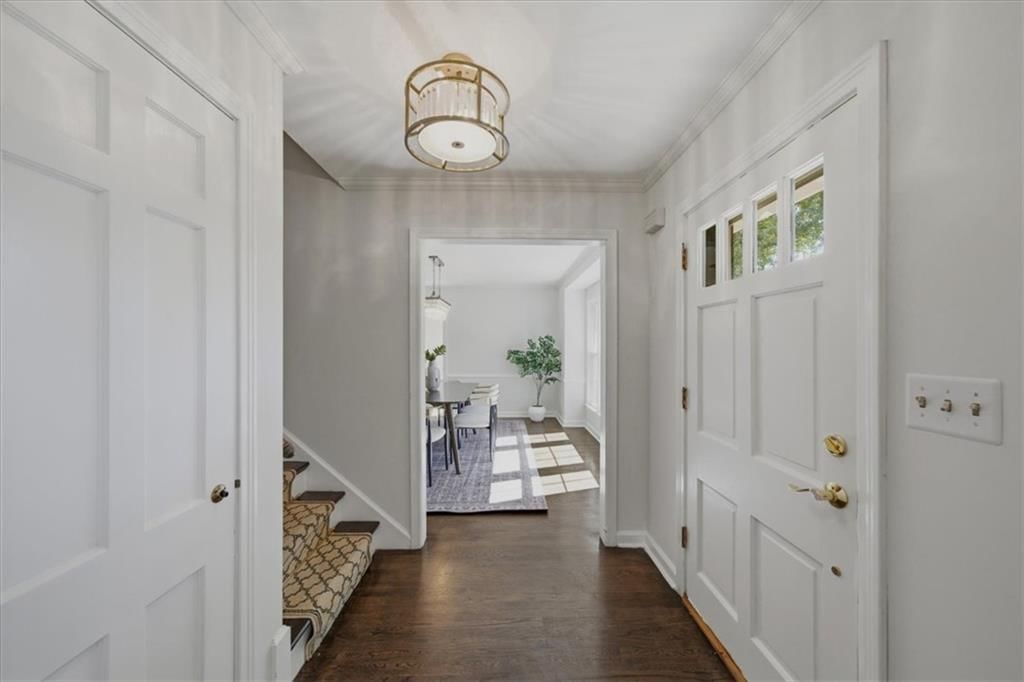 Hardwood floors, staircase and wood stair railing at 3714 W 61st Terrace, Fairway, KS 66205