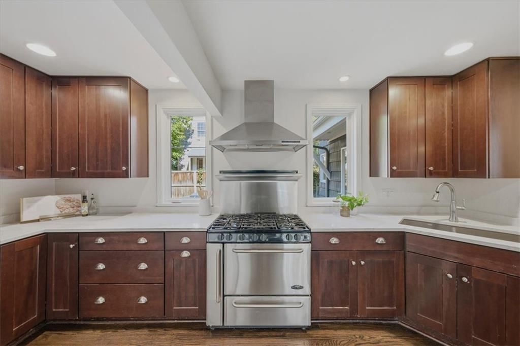 Gas range and kitchen backsplash at 3714 W 61st Terrace, Fairway, KS 66205