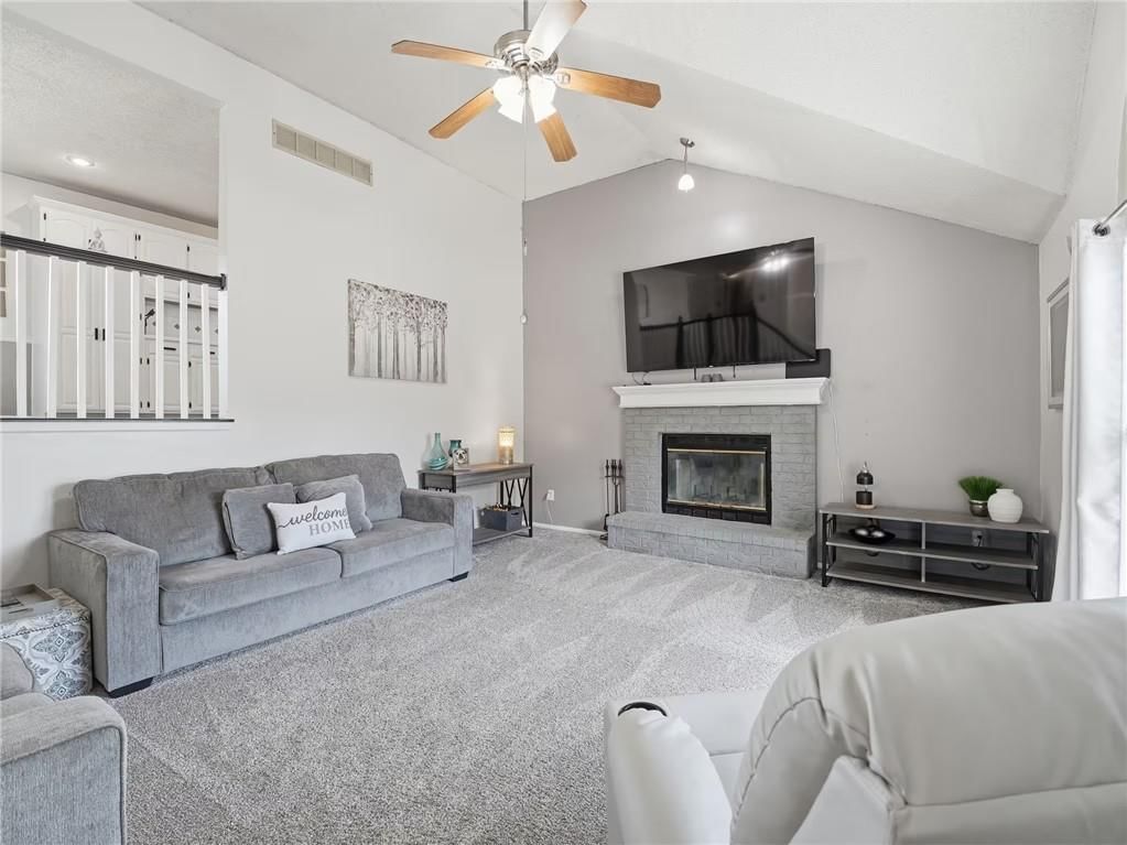Fireplace, tile fireplace and accent wall at 713 NW Rosaceae Drive, Blue Springs, MO 64015