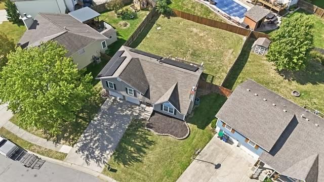 Corner lot and solar panels at 713 NW Rosaceae Drive, Blue Springs, MO 64015